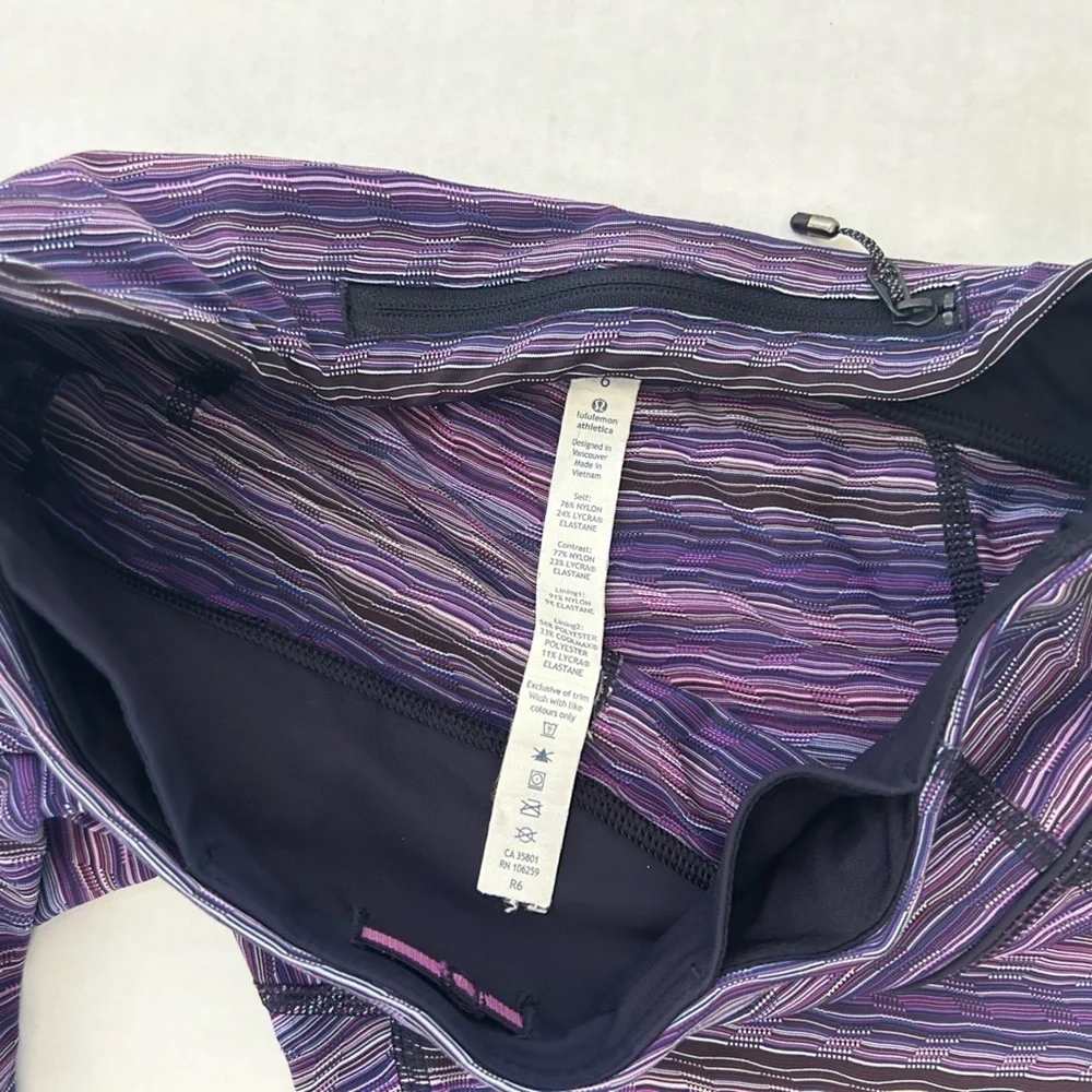 Lululemon striped purple legging w/back zip pocket & 2‎ side pockets Sz-6. Z19